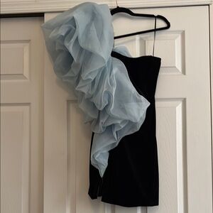 Elegant Black Dress with Blue Ruffle Accent